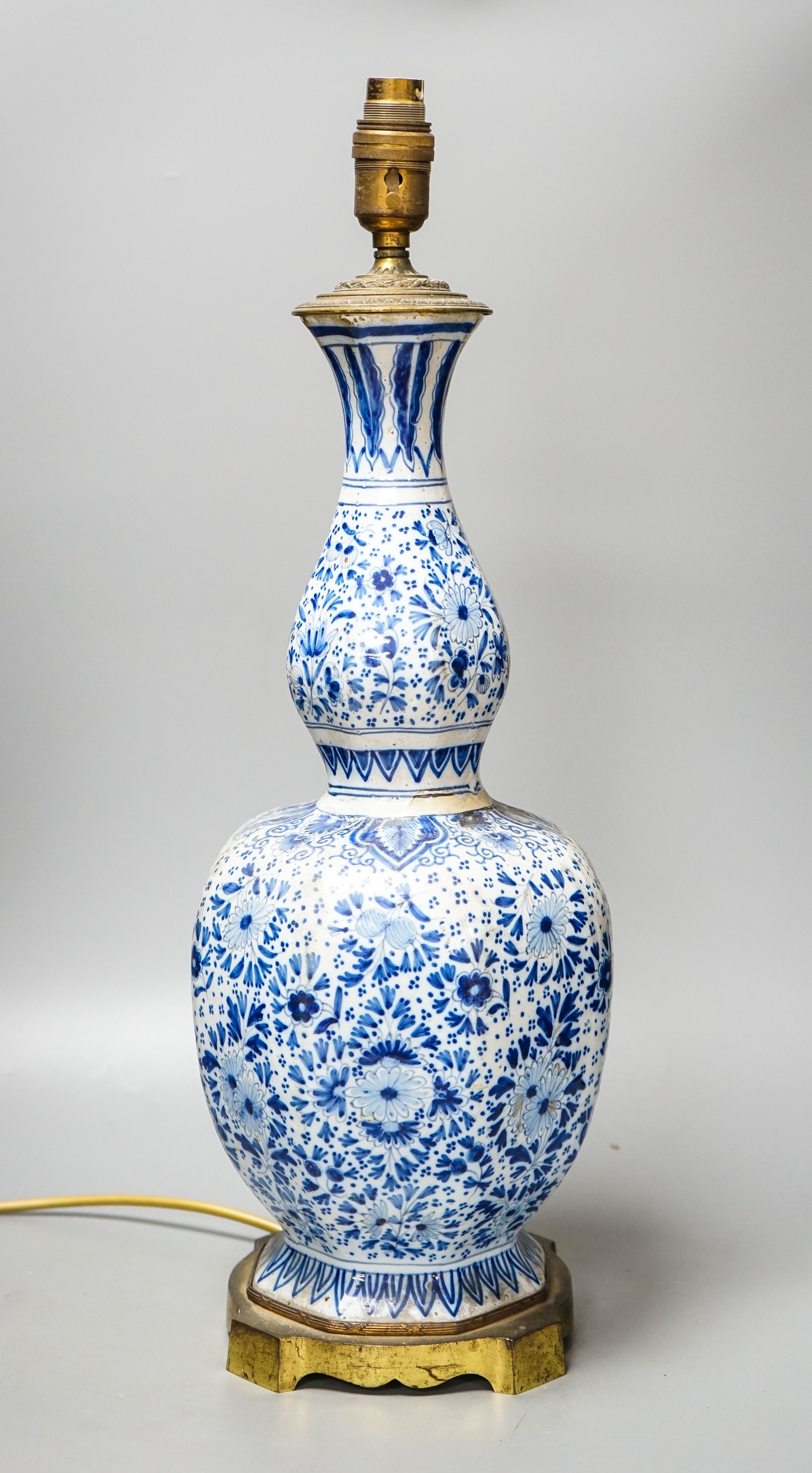 An 18th/19th century Delft blue and white octagonal double gourd vase, mounted as a lamp 50 cm